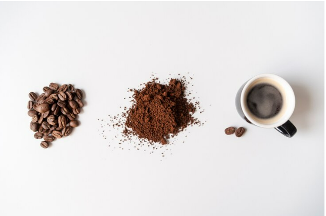 coffee beans, ground coffee and a cup of coffee