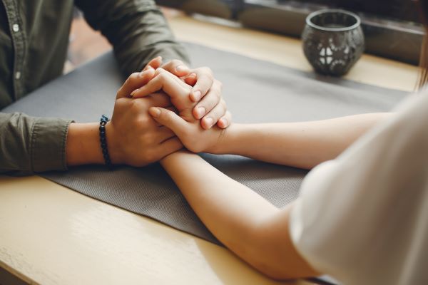 couple holding hands