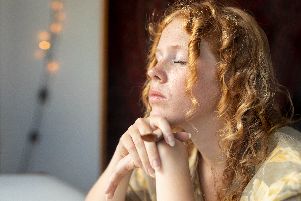 repentance woman with eye closed